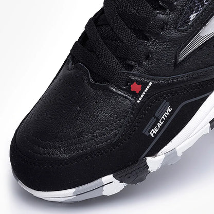 Chuteira de Society Joma Fs Reactive Masculino Preto e Branco